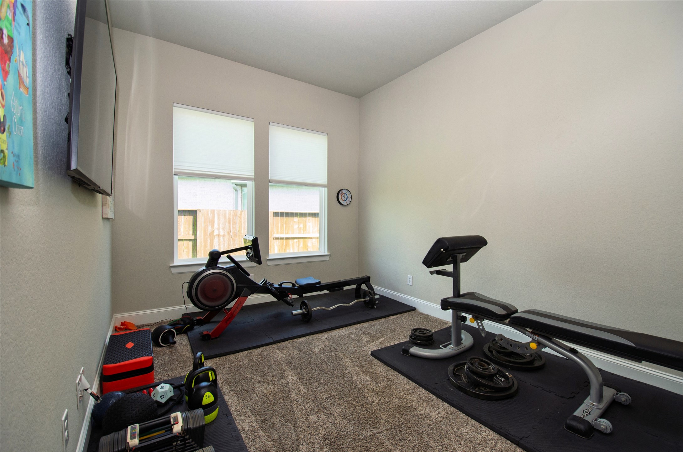 4143 Shackleton Court Iowa Colony, TX 77583 - Photo 24 of 34 Exercise room or can be used as an office/study or a 4th bedroom if closed in.