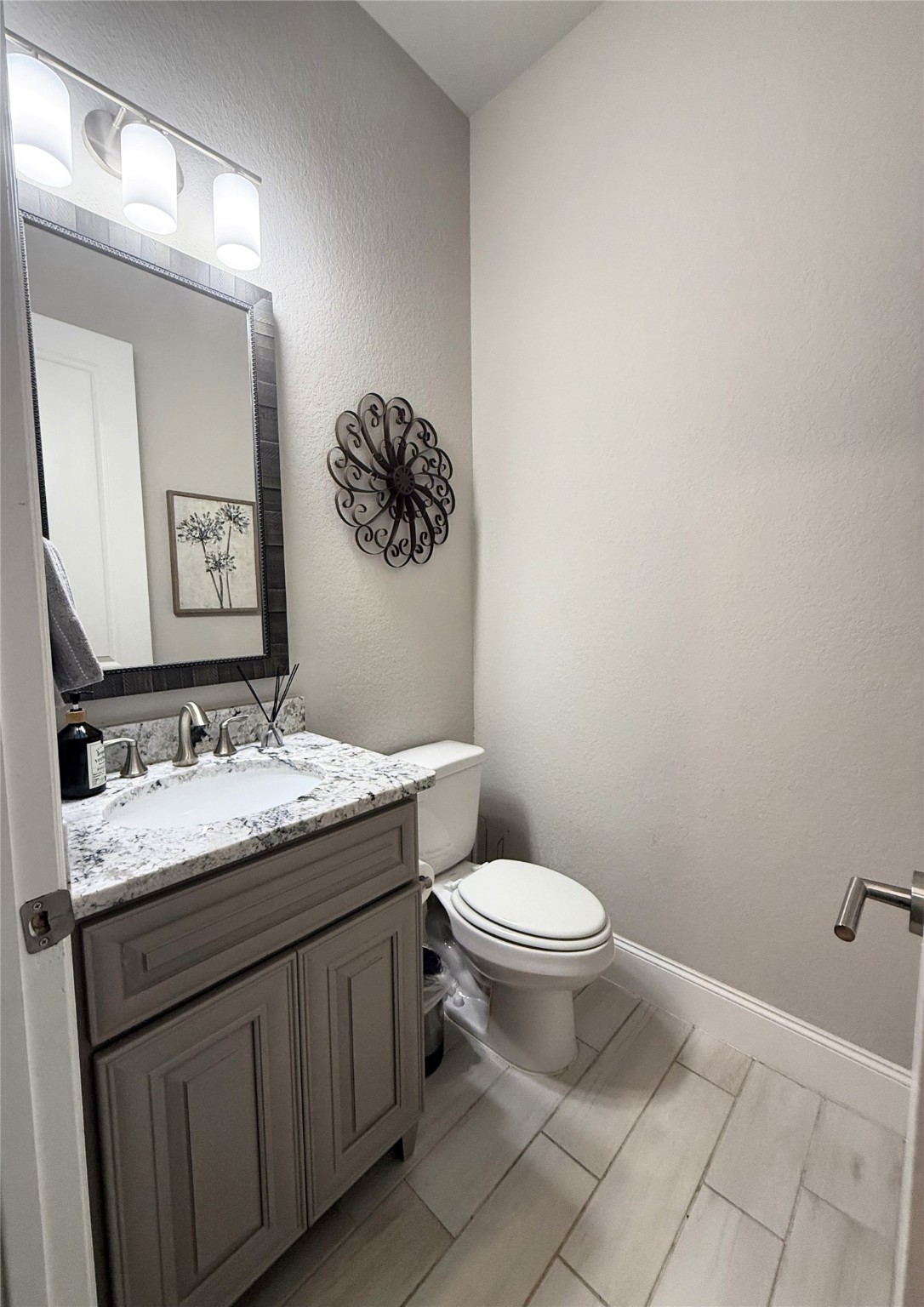 4143 Shackleton Court Iowa Colony, TX 77583 - Photo 26 of 34 Half bath near the garage and laundry room.