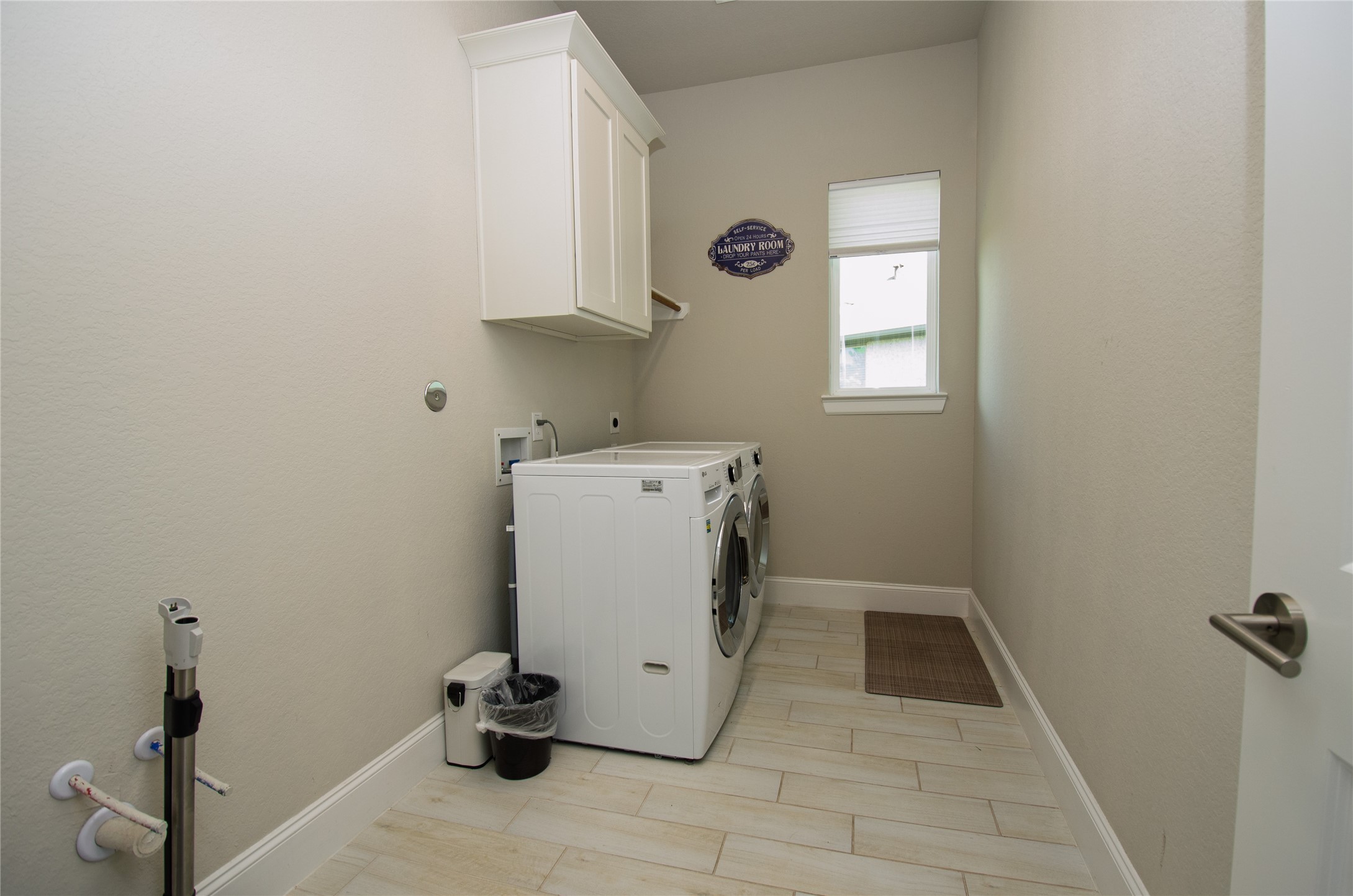 4143 Shackleton Court Iowa Colony, TX 77583 - Photo 27 of 34 Large laundry room with plumbing for a sink and room for a extra fridge or freezer.