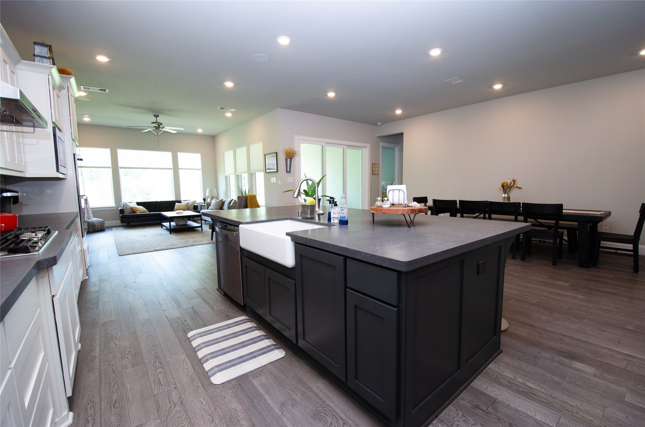 4143 Shackleton Court Iowa Colony, TX 77583 - Photo 9 of 34 The open-concept kitchen and dining area offers plenty of natural light from the sliding glass doors creating great atmosphere for entertaining.