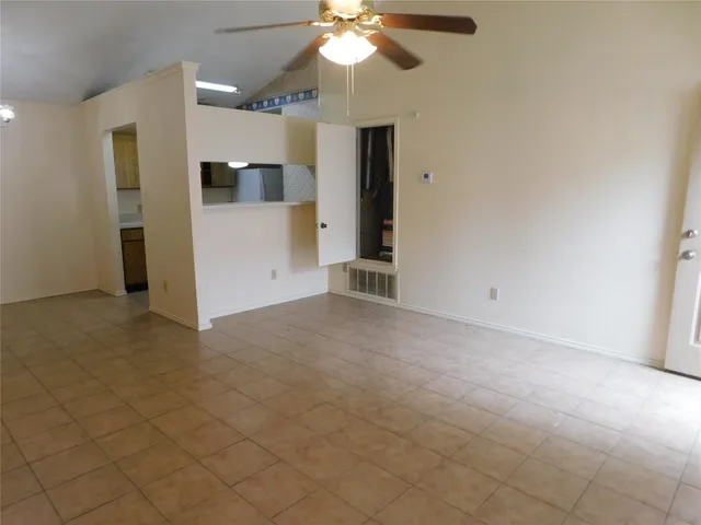 a view of a kitchen with a sink