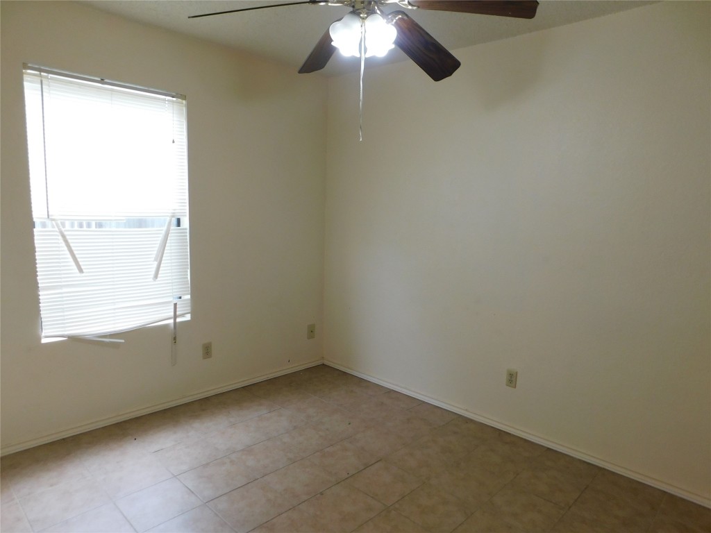 2027 Redwing Way Round Rock, TX 78664 - Photo 9 of 13 an empty room with a window