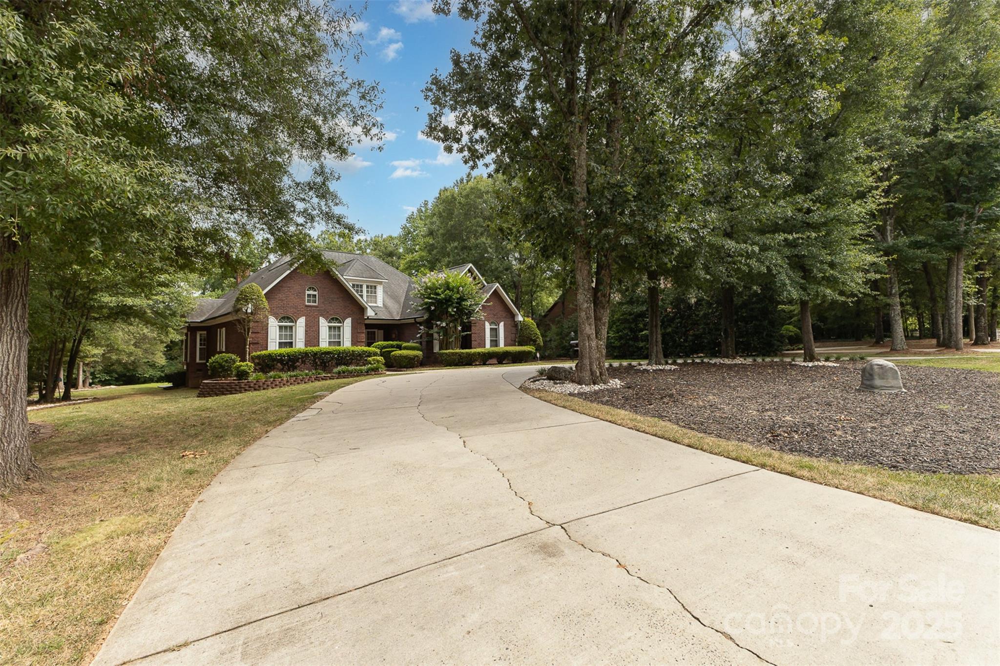 5619 Weddington Road Concord, NC 28027 - Photo 4 of 48 a front view of a house with a yard