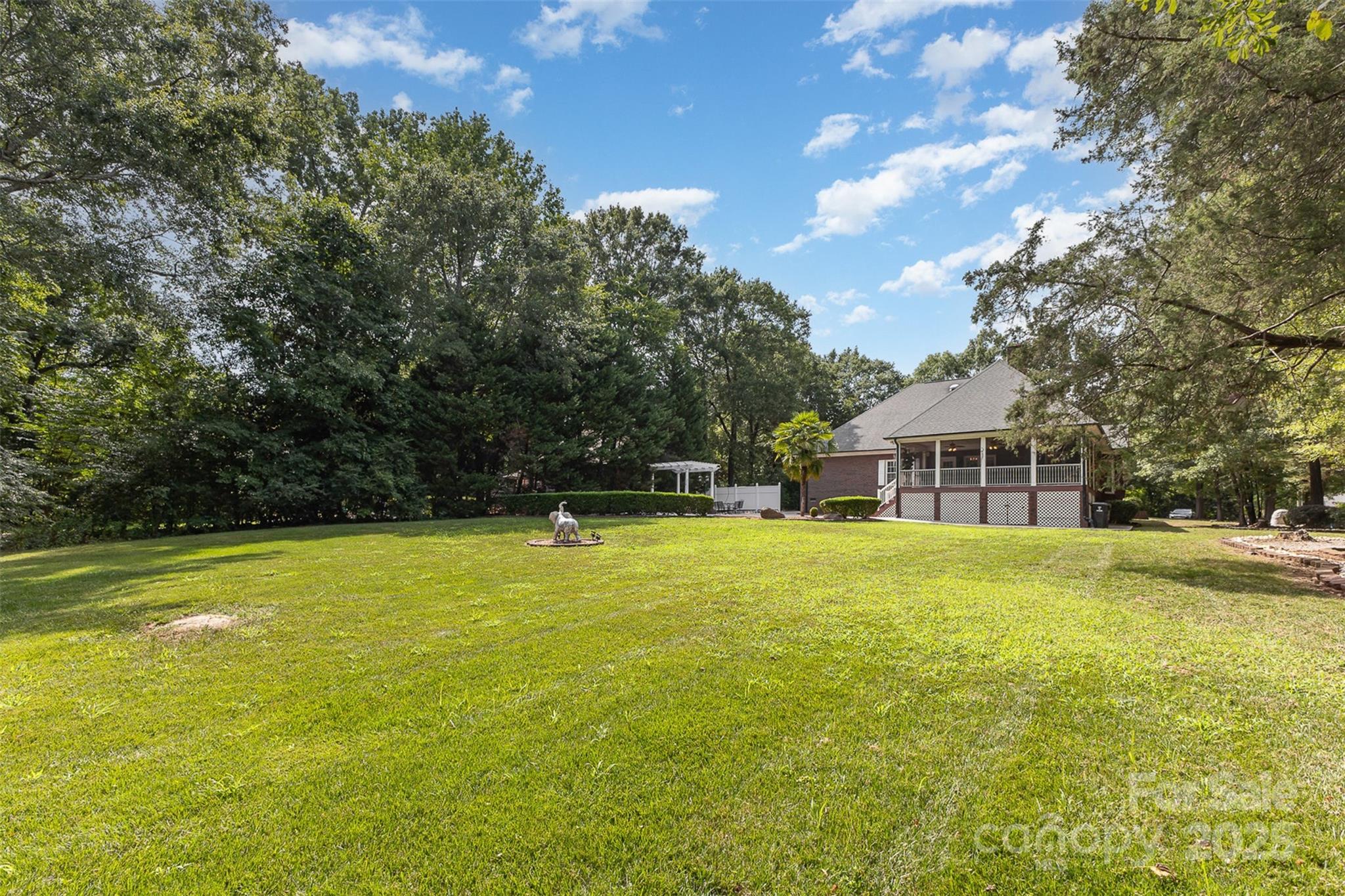 5619 Weddington Road Concord, NC 28027 - Photo 41 of 48 a front view of a house with a garden