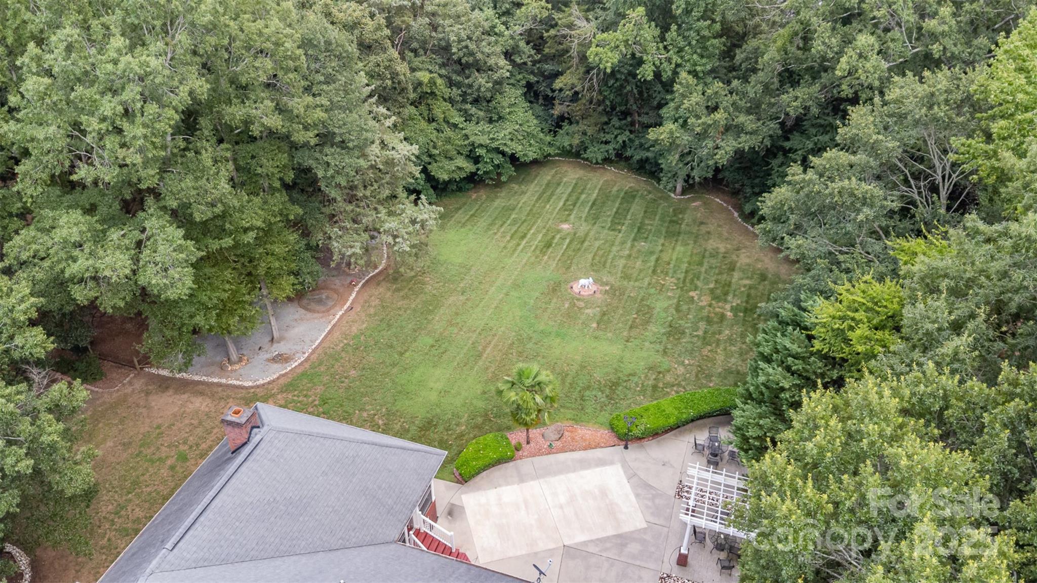 5619 Weddington Road Concord, NC 28027 - Photo 43 of 48 a view of a backyard of a house