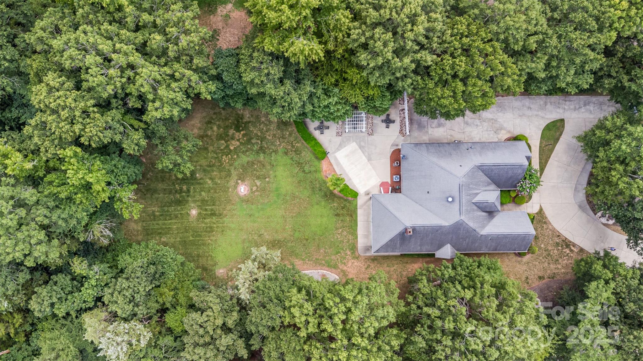 5619 Weddington Road Concord, NC 28027 - Photo 44 of 48 an aerial view of residential house with outdoor space and trees all around