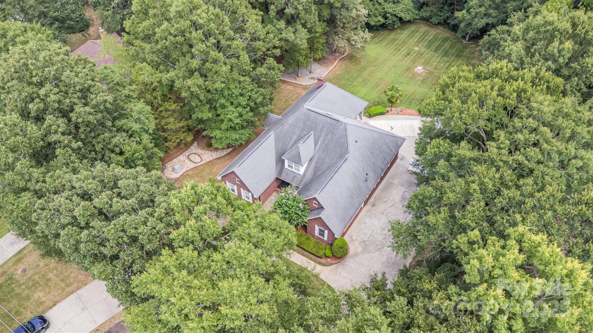 5619 Weddington Road Concord, NC 28027 - Photo 45 of 48 a view of a house in a yard