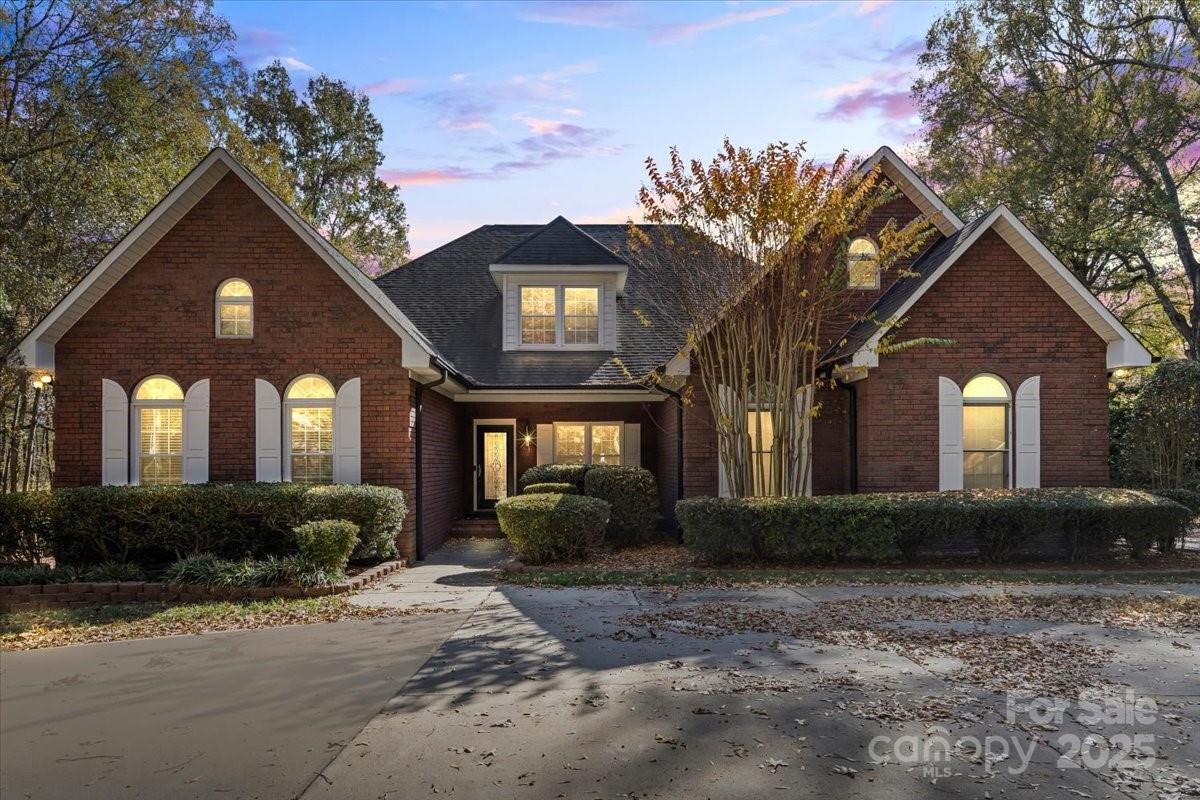 5619 Weddington Road Concord, NC 28027 - Photo 46 of 48 a front view of a house with garden