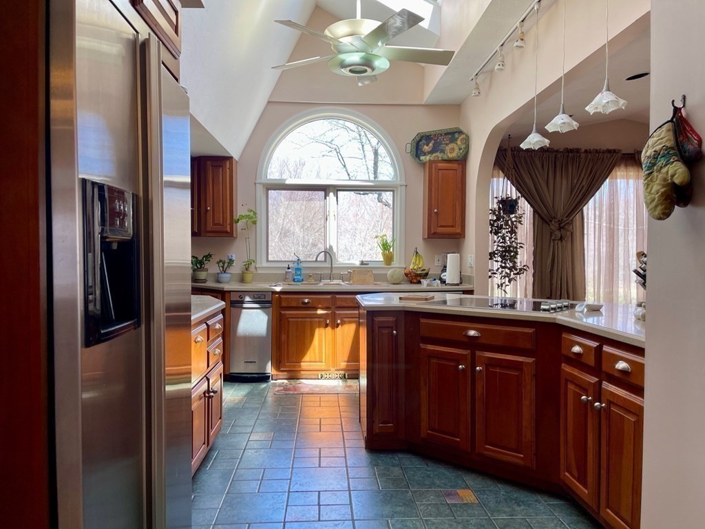 15 Wales Road Brimfield, MA 01010 - Photo 13 of 41 a bathroom with a granite countertop sink a large mirror and a refrigerator
