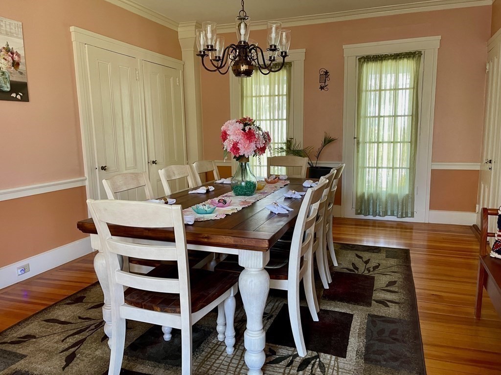 15 Wales Road Brimfield, MA 01010 - Photo 17 of 41 a view of a dining room with furniture a chandelier and wooden floor