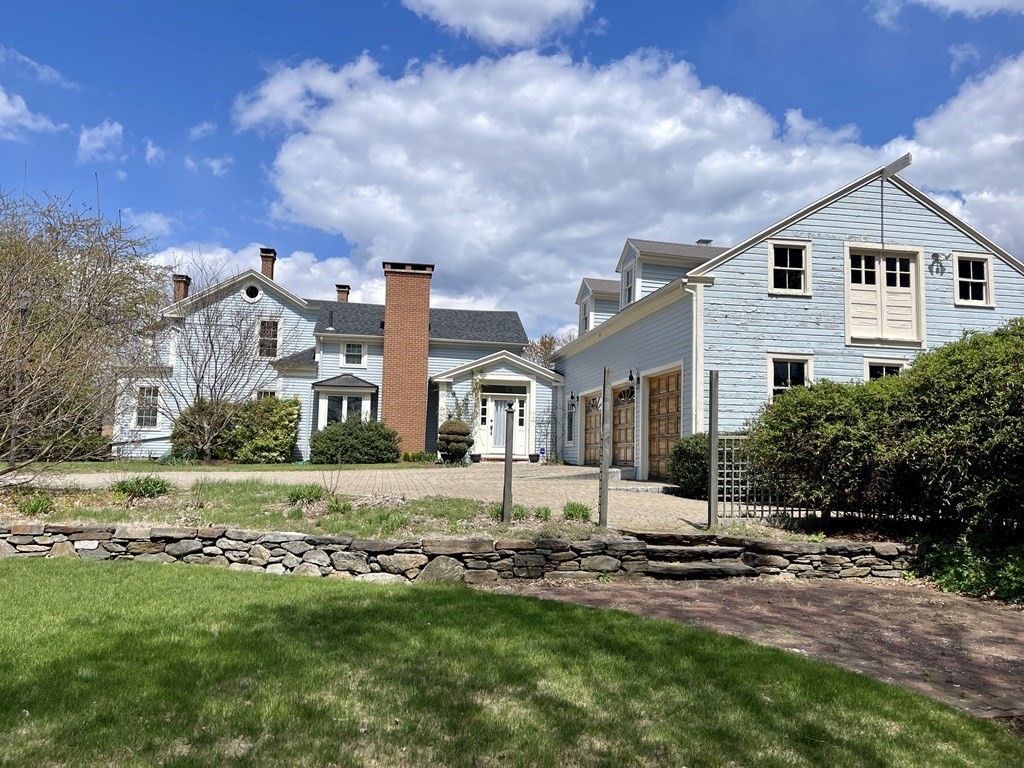 15 Wales Road Brimfield, MA 01010 - Photo 2 of 41 a view of a house with a big yard and large trees