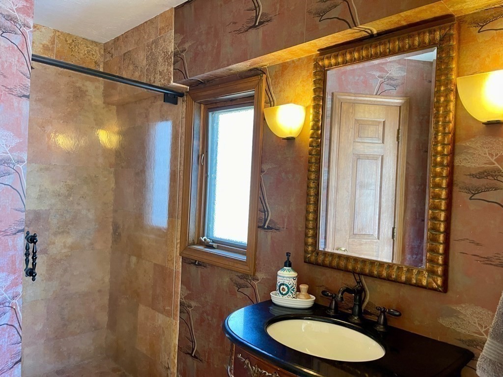 15 Wales Road Brimfield, MA 01010 - Photo 22 of 41 a bathroom with a sink mirror vanity and toilet