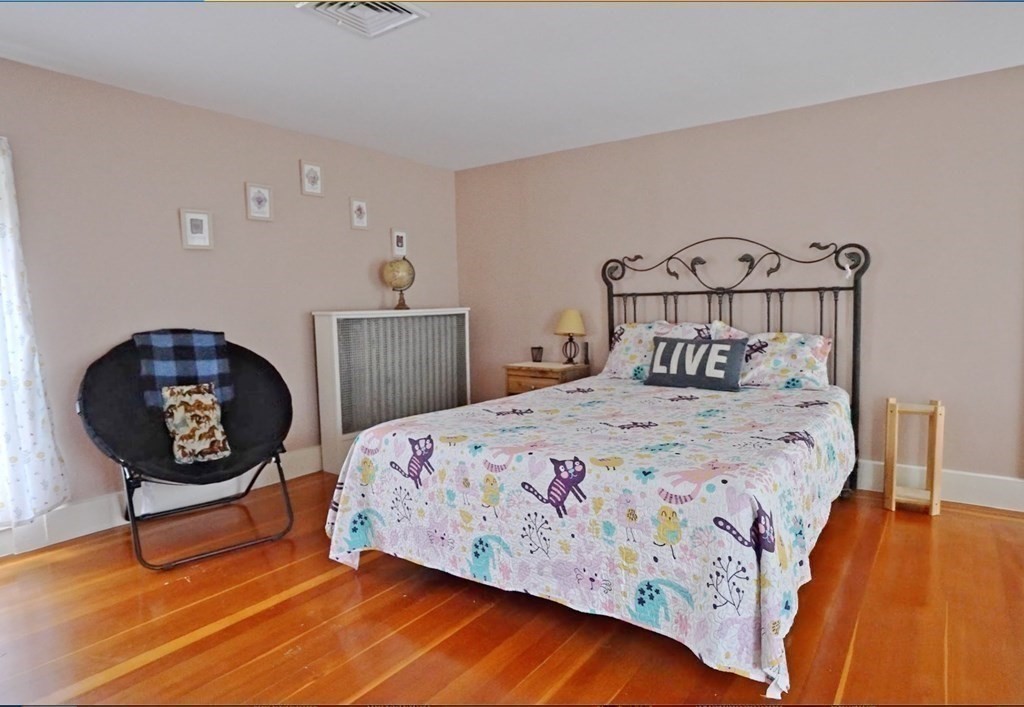 15 Wales Road Brimfield, MA 01010 - Photo 25 of 41 a bedroom with a bed a dresser and chair