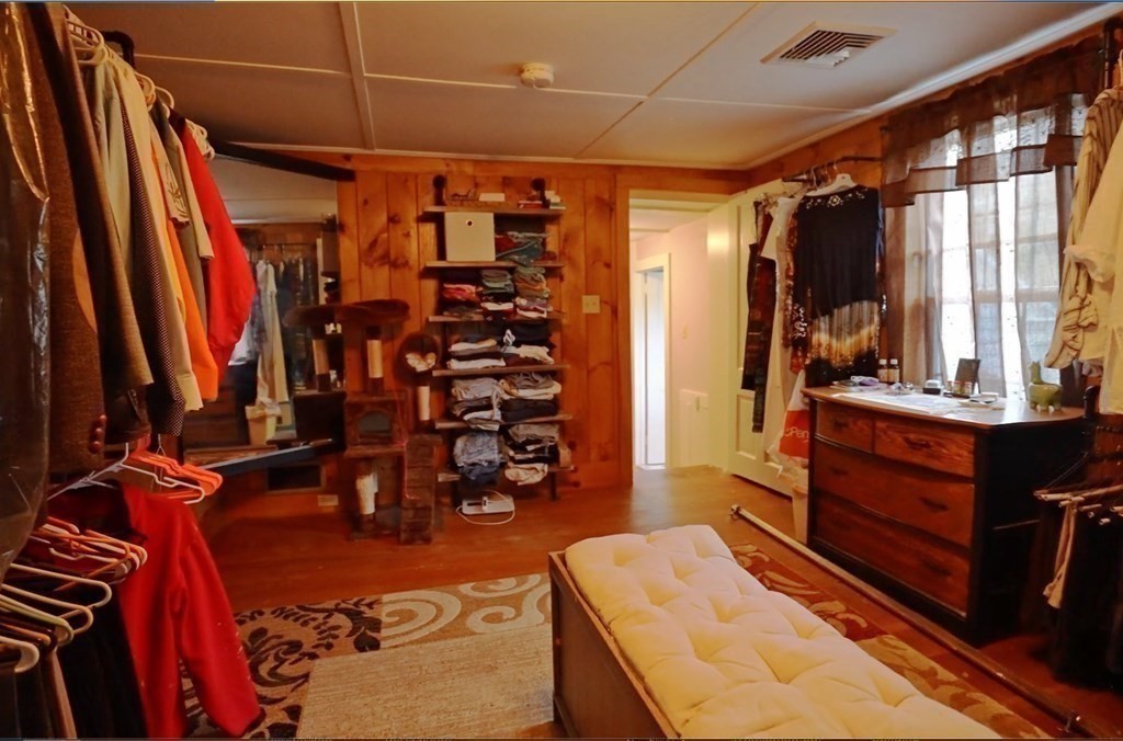 15 Wales Road Brimfield, MA 01010 - Photo 28 of 41 a view of walk in closet with clothes and shoes