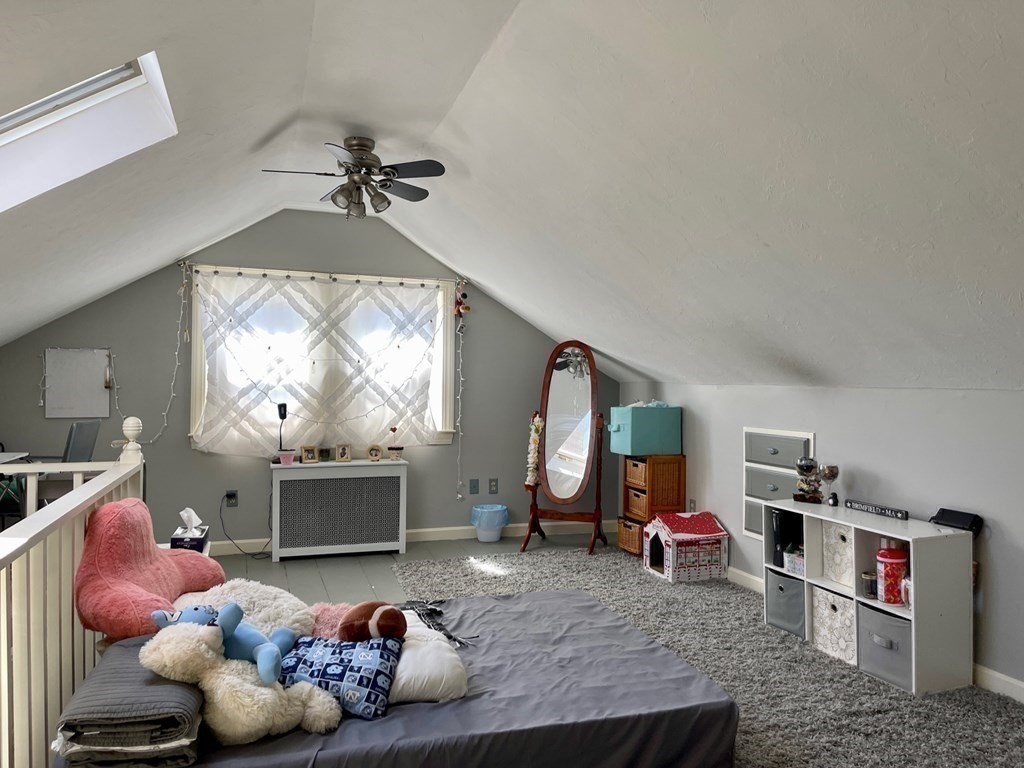 15 Wales Road Brimfield, MA 01010 - Photo 29 of 41 a living room with fireplace furniture and a chandelier