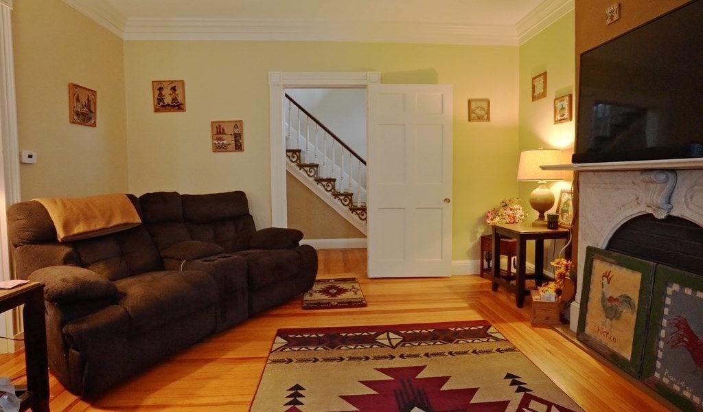 15 Wales Road Brimfield, MA 01010 - Photo 9 of 41 a living room with furniture fireplace and flat screen tv