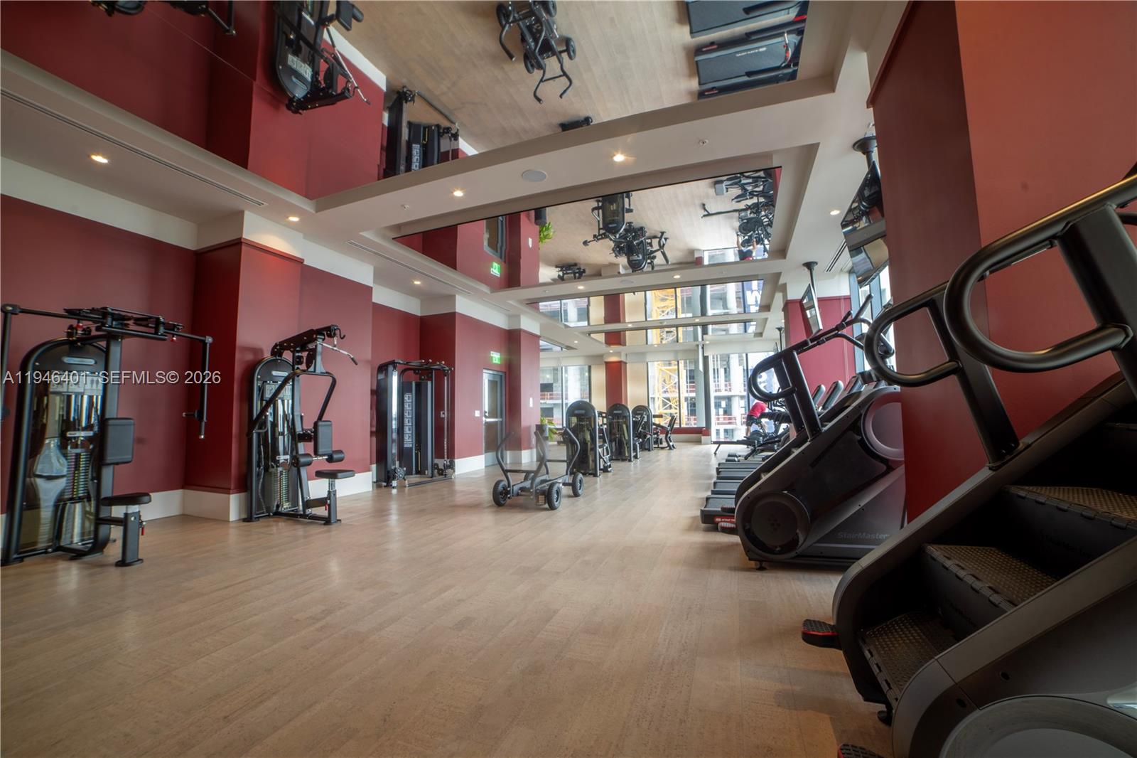 11 Northeast 6th Street, Unit 1908 Miami, FL 33132 - Photo 22 of 38 a view of a room with gym equipment