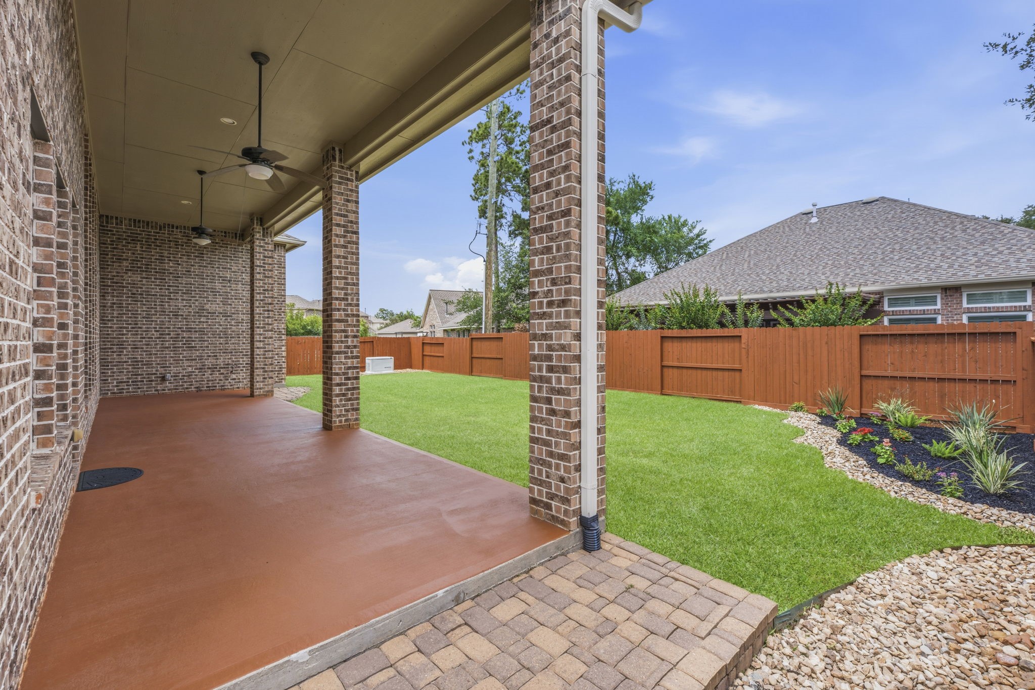 25210 Gaddis Oaks Drive Spring, TX 77389 - Photo 39 of 50 a view of a house with backyard and porch