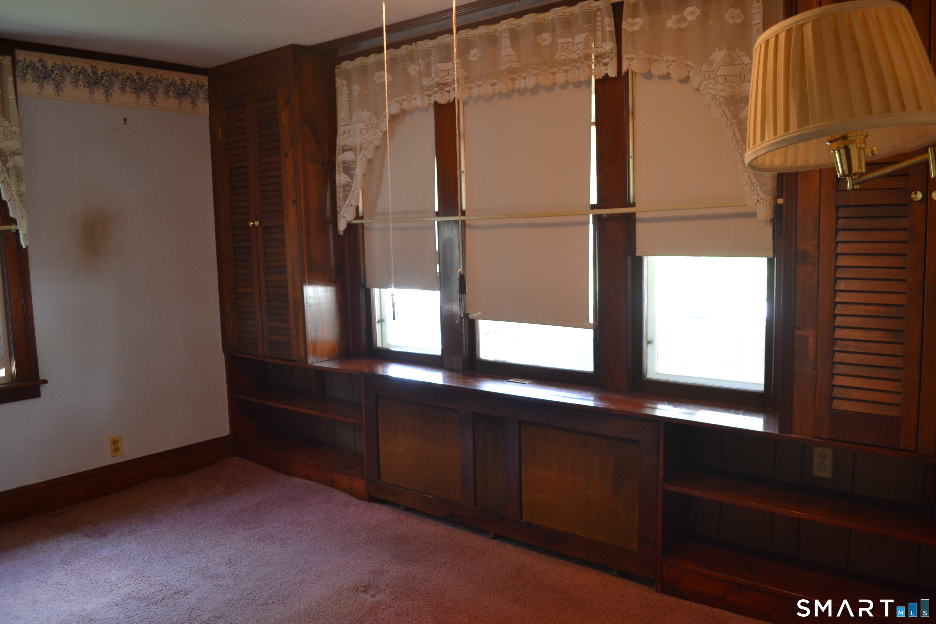 284 Deerfield Road Windsor, CT 06095 - Photo 22 of 31 a kitchen with a refrigerator and window