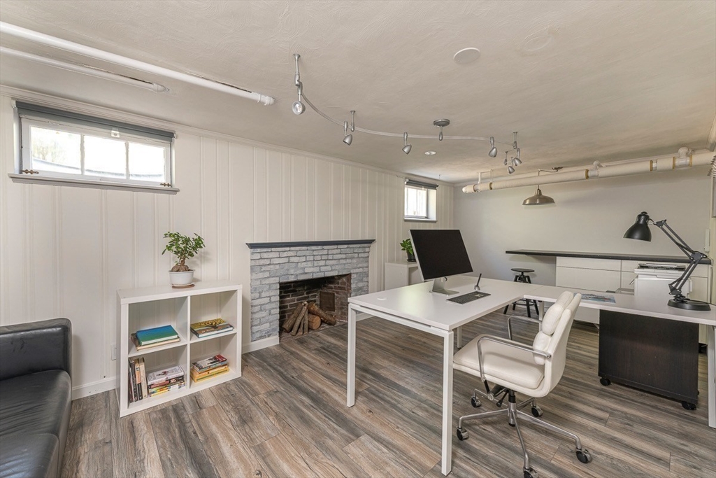 50 Parker Road Wellesley, MA 02482 - Photo 19 of 26 a open kitchen with a table and chairs