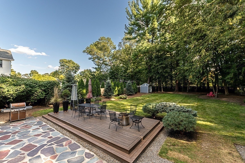 50 Parker Road Wellesley, MA 02482 - Photo 23 of 26 a view of a backyard with sitting area