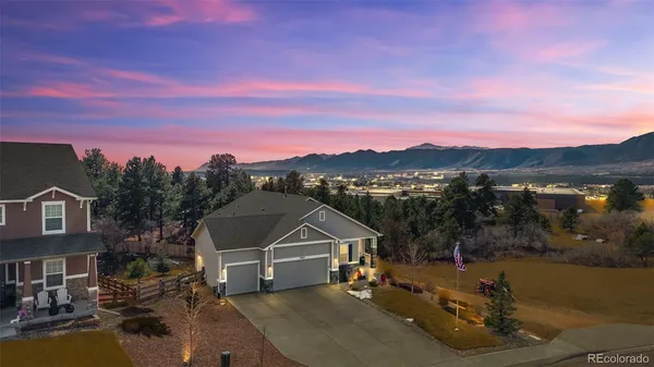 a view of a houses with a city street