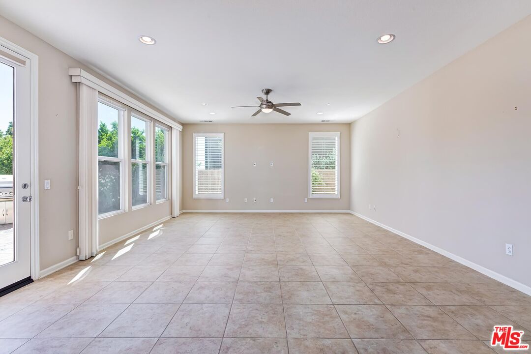 11656 North Ricasoli Way Porter Ranch, CA 91326 - Photo 9 of 51 a view of an empty room with a window