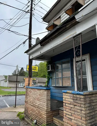 a front view of a house with garage