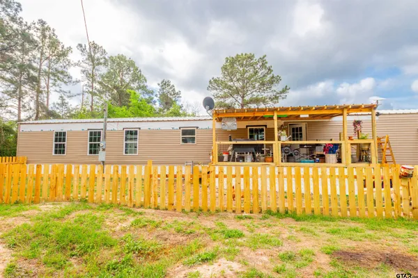 front view of a house with a big yard