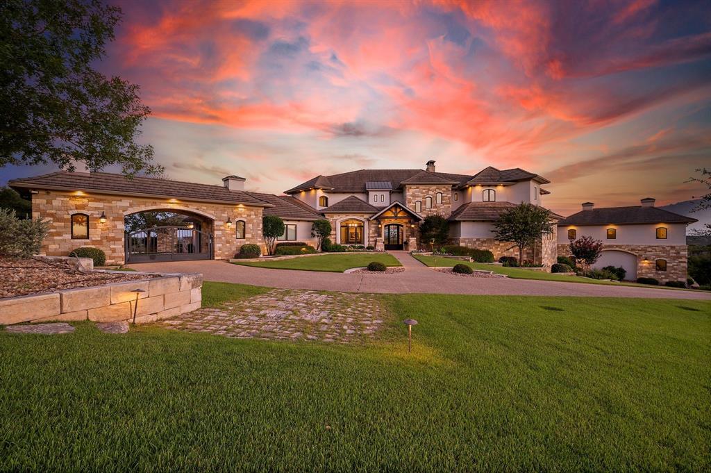 325 River Ridge Spring Branch, TX 78070 - Photo 1 of 40 a house view with a garden space