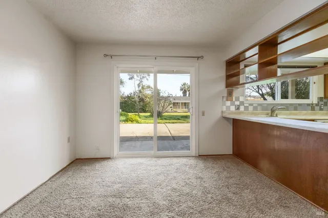 a view of a room with a window
