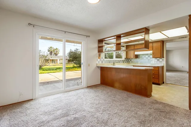 an empty room with a large window