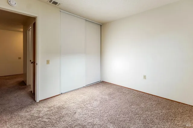 an empty room with closet
