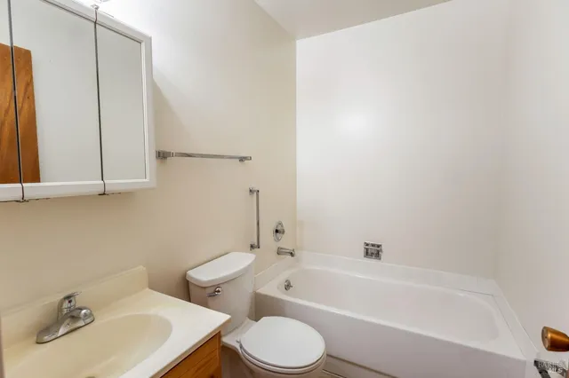 a bathroom with a sink and a bathtub