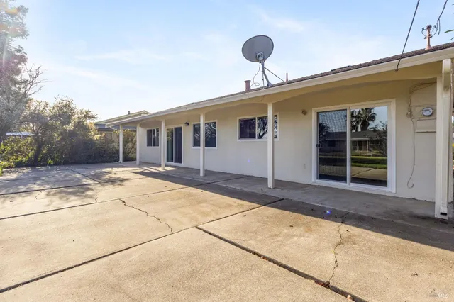 a front view of a house with a garage
