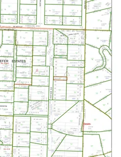 a view of a large window with a black and white house