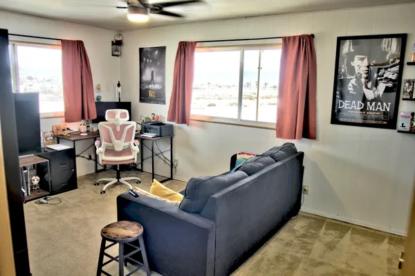 a very nice looking room with many windows