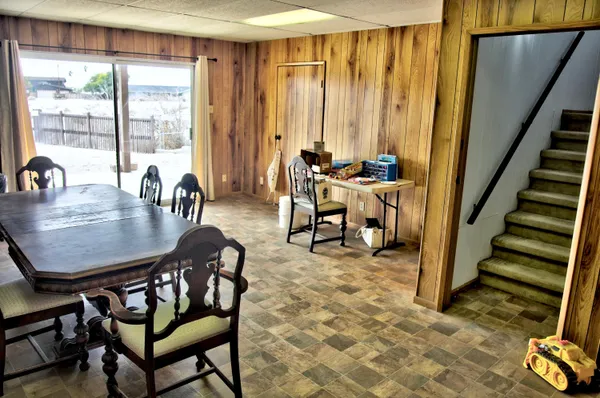 a kitchen with a sink cabinets and window