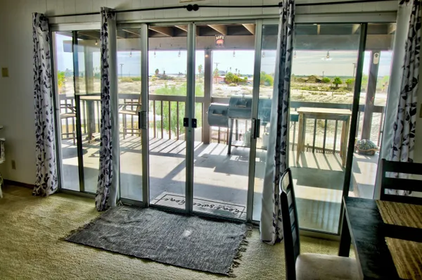a view of a porch with a bench