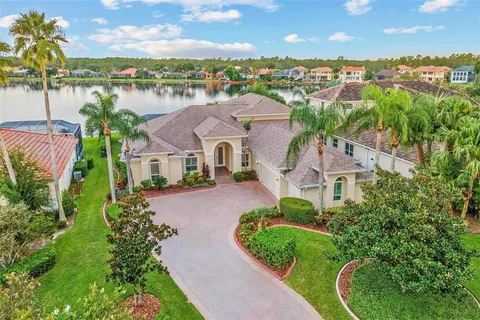 a view of a lake with wooden floor and city view