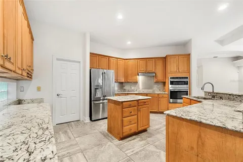 a spacious bathroom with a tub a sink and a shower
