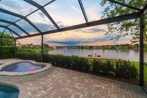 a view of a lake with a big yard