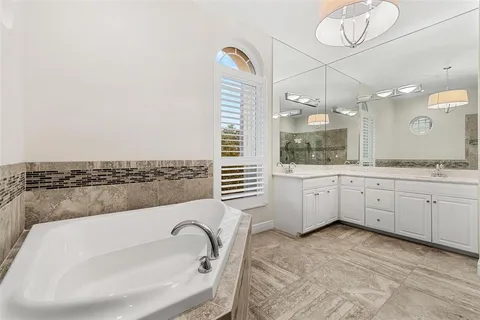 a utility room with sink dryer and washer