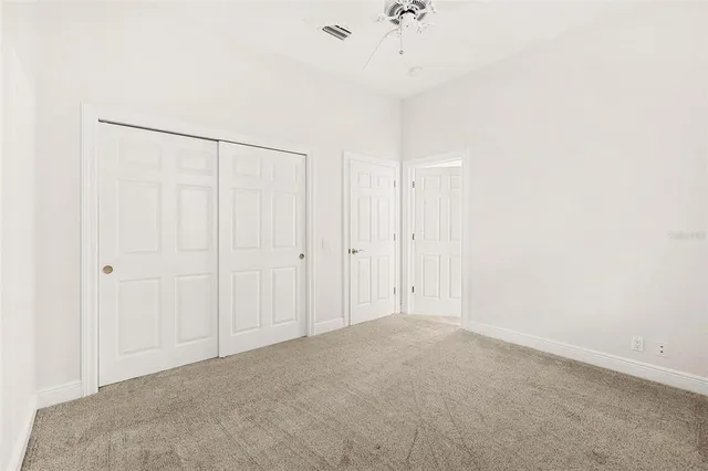 a view of a balcony with chairs