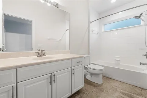 a view of a balcony with chairs