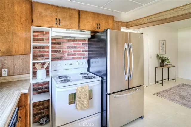 a view of a storage & utility room with a window