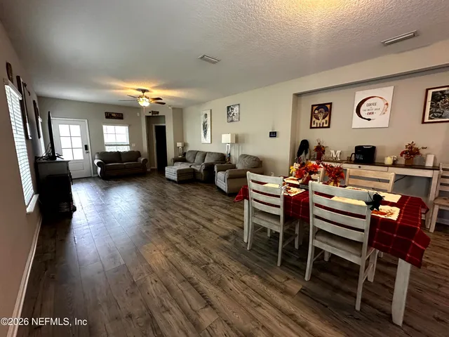 a view of a livingroom with furniture and a couch