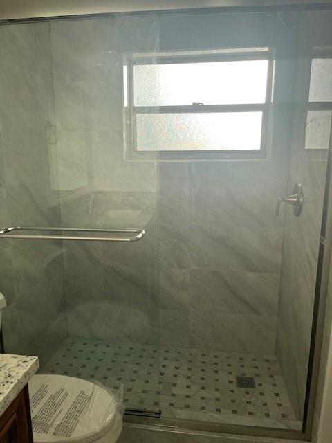 5100 Southwest 90th Avenue, Unit 410 Cooper City, FL 33328 - Photo 12 of 15 a bathroom with a toilet and a shower