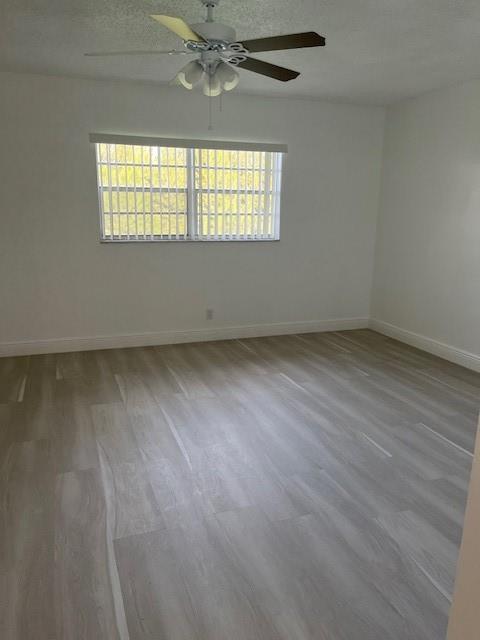 5100 Southwest 90th Avenue, Unit 410 Cooper City, FL 33328 - Photo 9 of 15 an empty room with windows