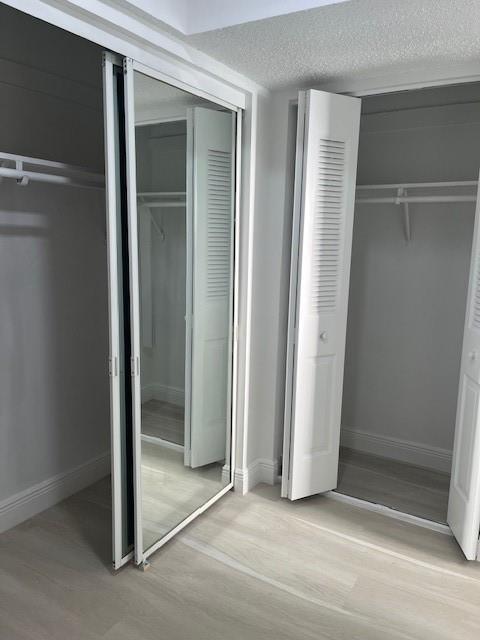 5100 Southwest 90th Avenue, Unit 410 Cooper City, FL 33328 - Photo 10 of 15 an empty room with sliding door